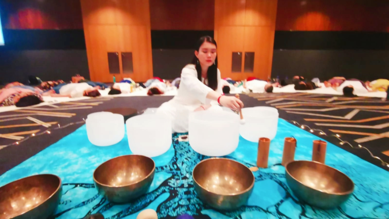 Michele Chong is conducting Sound Therapy at Suntec City Convention Hall Singapore